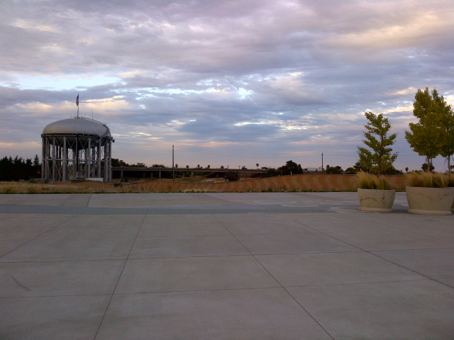 Behind the water tower, on the newly built water facility. 