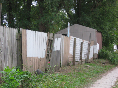 Encourage/enforce well maintained fences