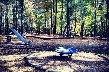 Holt School Road Park has a picnic shelterm pay structures and a nature trail