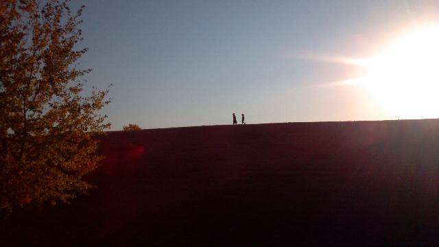 Brother and Sister take a sunset walk on the Greenway in EGF.