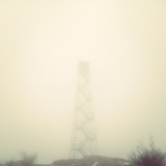 Foggy fire tower atop Mt Beacon