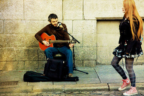 Have an outdoor "busker" aka street musician night.